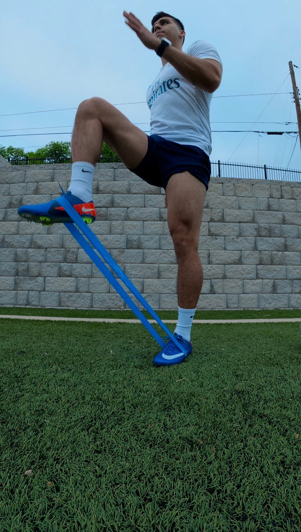 Elevación de rodilla con banda